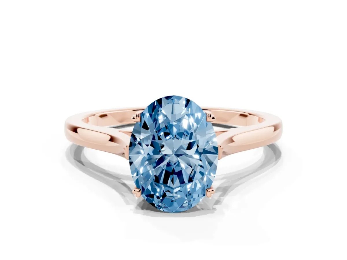 Fancy Blue Oval Cut Solitaire Heart Prong Engagement Ring with Tapered Band Rose gold