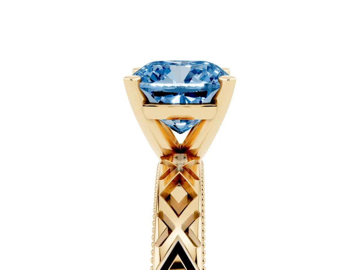 Fancy Blue Cushion Cut Solitaire Diamond Ring with Milgrain and Black Enamel X Pattern Band Yellow gold