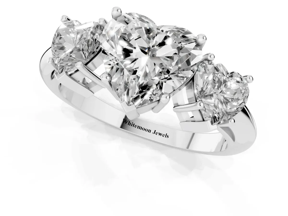 Three-Stone Heart Cut Cut Diamond Engagement Ring with Prong Setting on a White Gold Band Silver