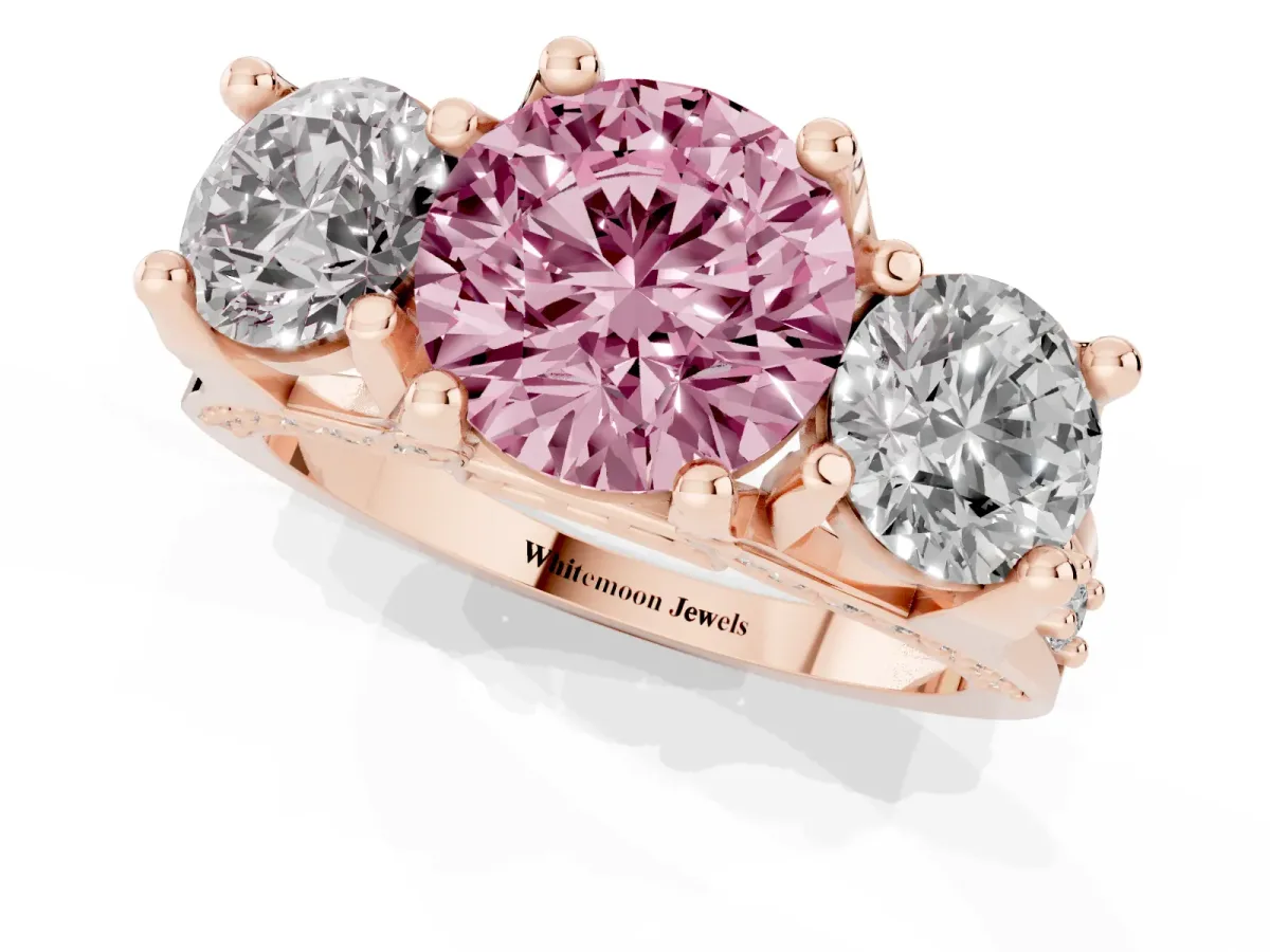 Fancy Pink Round Cut Diamond Three-Stone Ring with Channel Set Band and Four-Prong Setting Rose gold