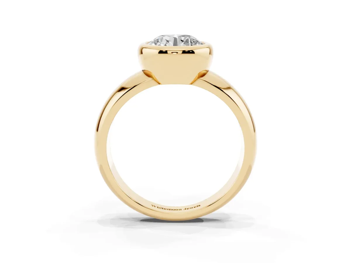 Bezel Set Round Cut Solitaire Ring with Wide Band Yellow gold