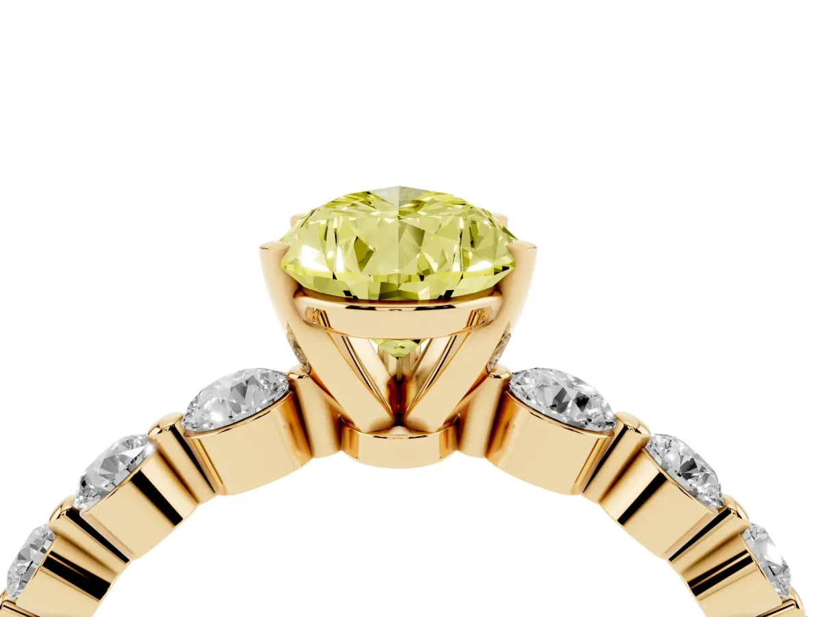 Fancy Yellow Pear Cut Solitaire Diamond Ring with Pave Band and Four-Prong Setting Yellow gold