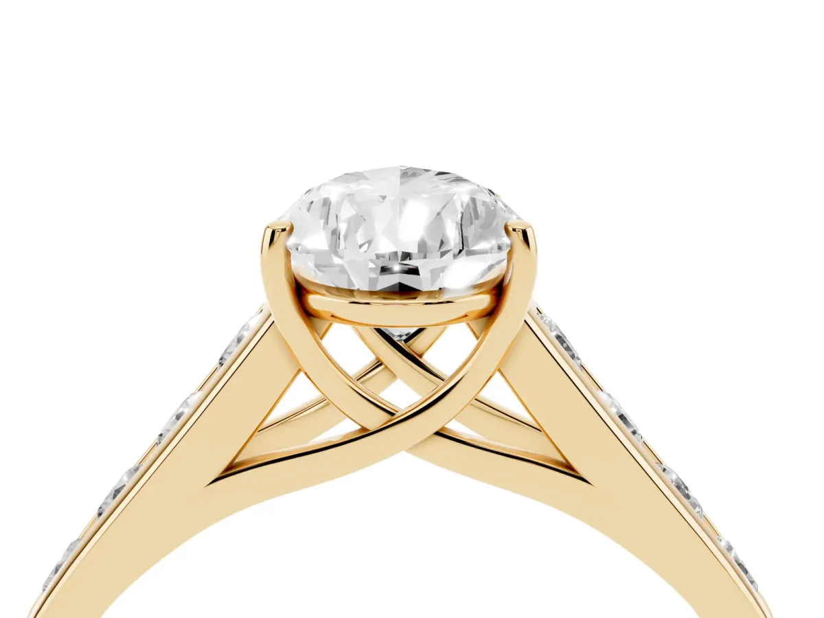 Pear Cut Brilliant Channel-Set Solitaire Ring with Four-Prong Setting Yellow gold