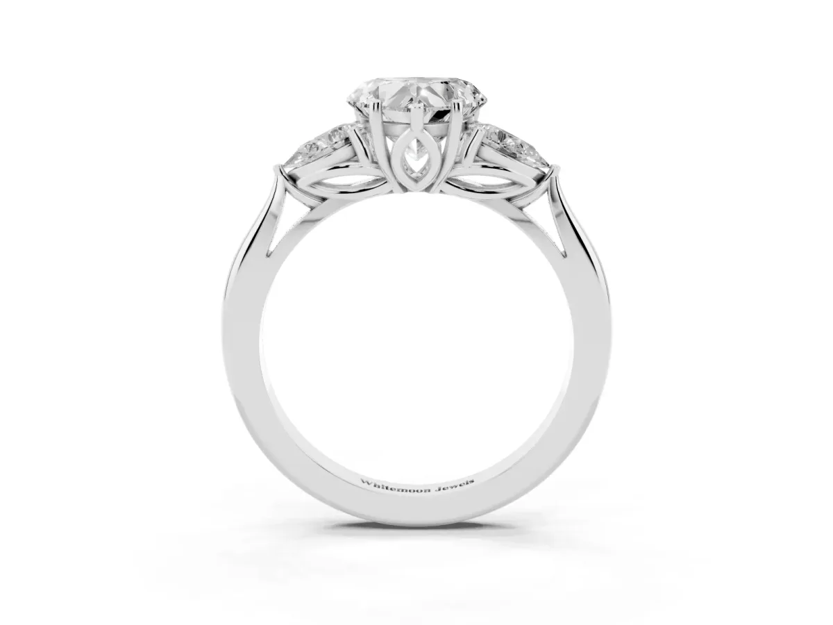 Three-Stone Heart Cut Brilliant Diamond Solitaire Ring with Tapered Band and Four-Prong Setting Silver