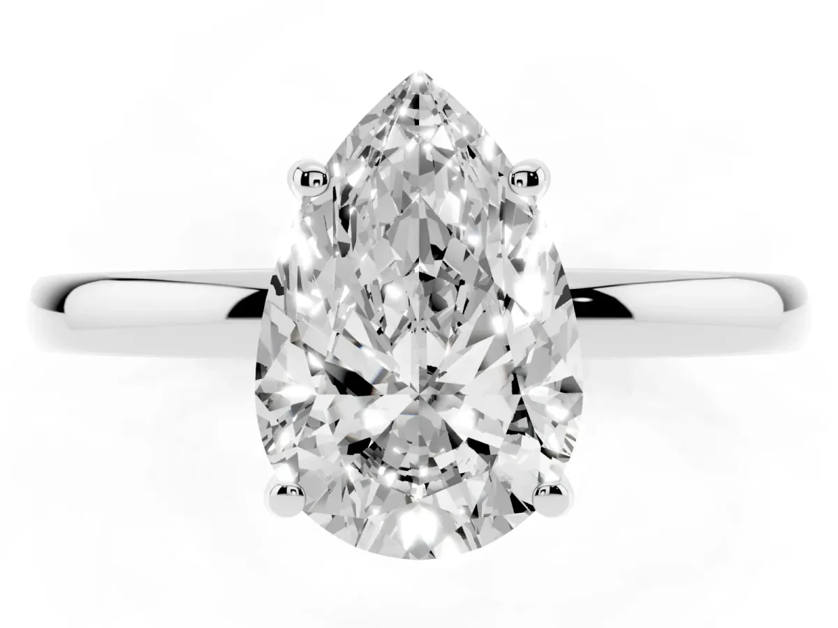 Pear Cut Solitaire Diamond Ring with Prong Setting and Plain Band Platinum