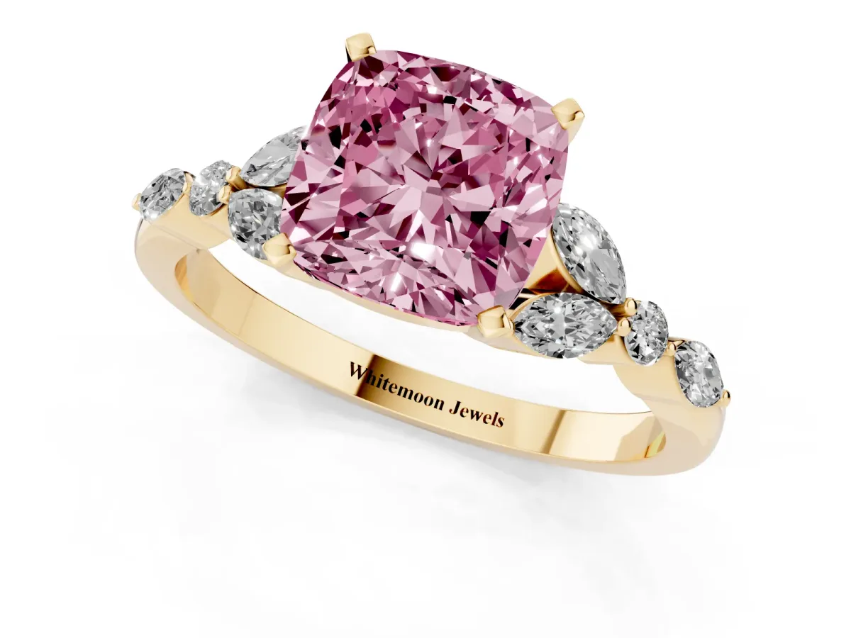 Fancy Pink Cushion Cut Diamond Solitaire Ring with Side Stones and Four-Prong Setting Yellow gold