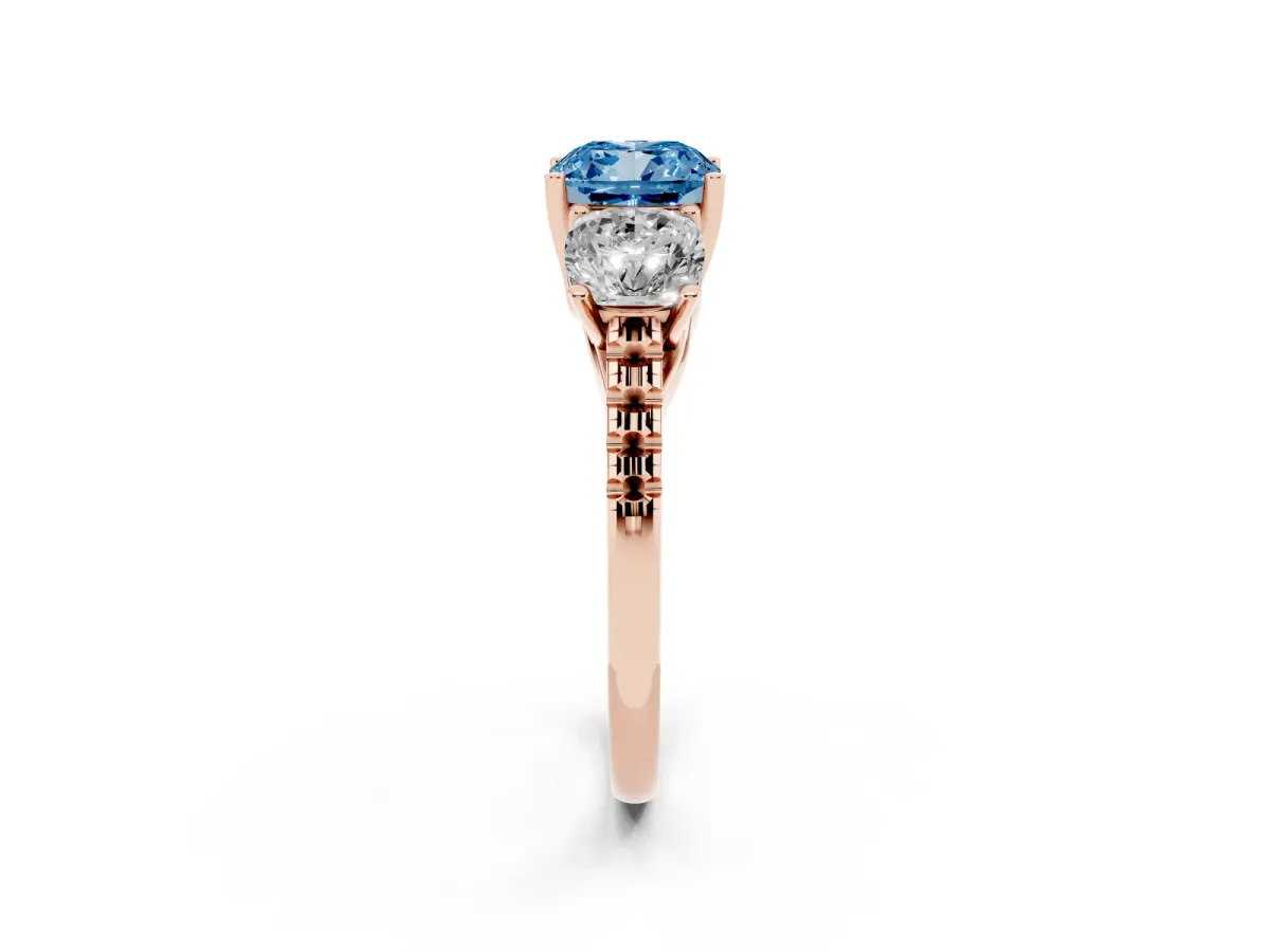 Fancy Blue Three-Stone Cushion Cut Diamond Ring with Round Pavé Band and Prong Setting Rose gold