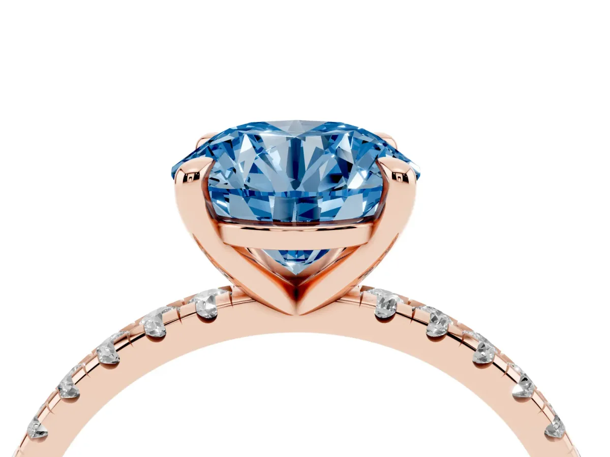 Fancy Blue Round Cut Diamond Brilliant Solitaire Ring with Pavé Band and Four-Prong Setting Rose gold