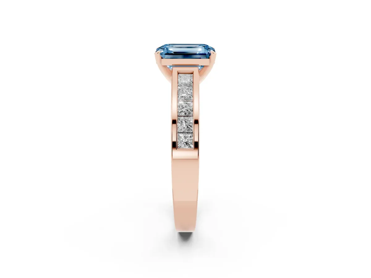 Fancy Blue Emerald Cut Solitaire Diamond Ring with Channel-Set Band and Four-Prong Setting Rose gold