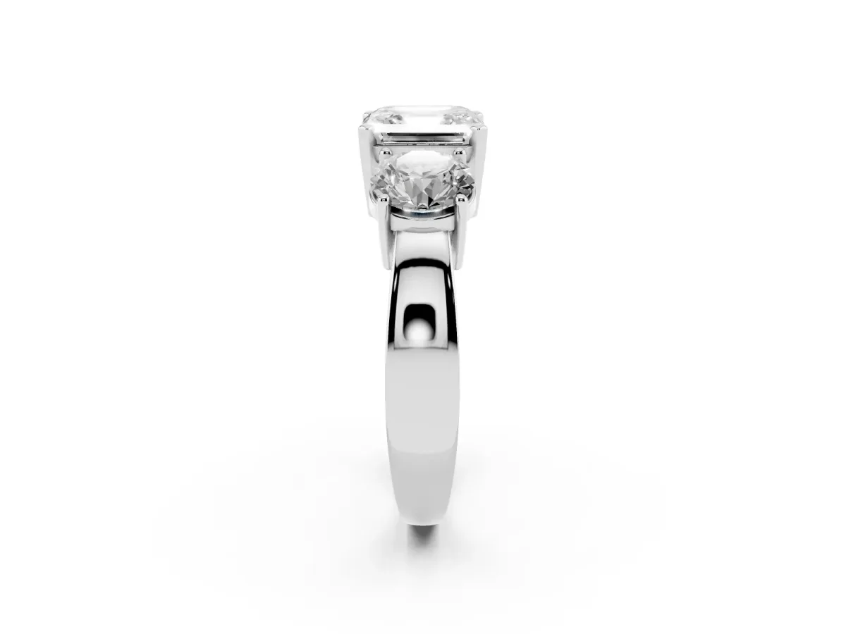 Three-Stone Asscher Cut Diamond Ring with Round Side Stones, Classic Band, and Four-Prong Setting Silver