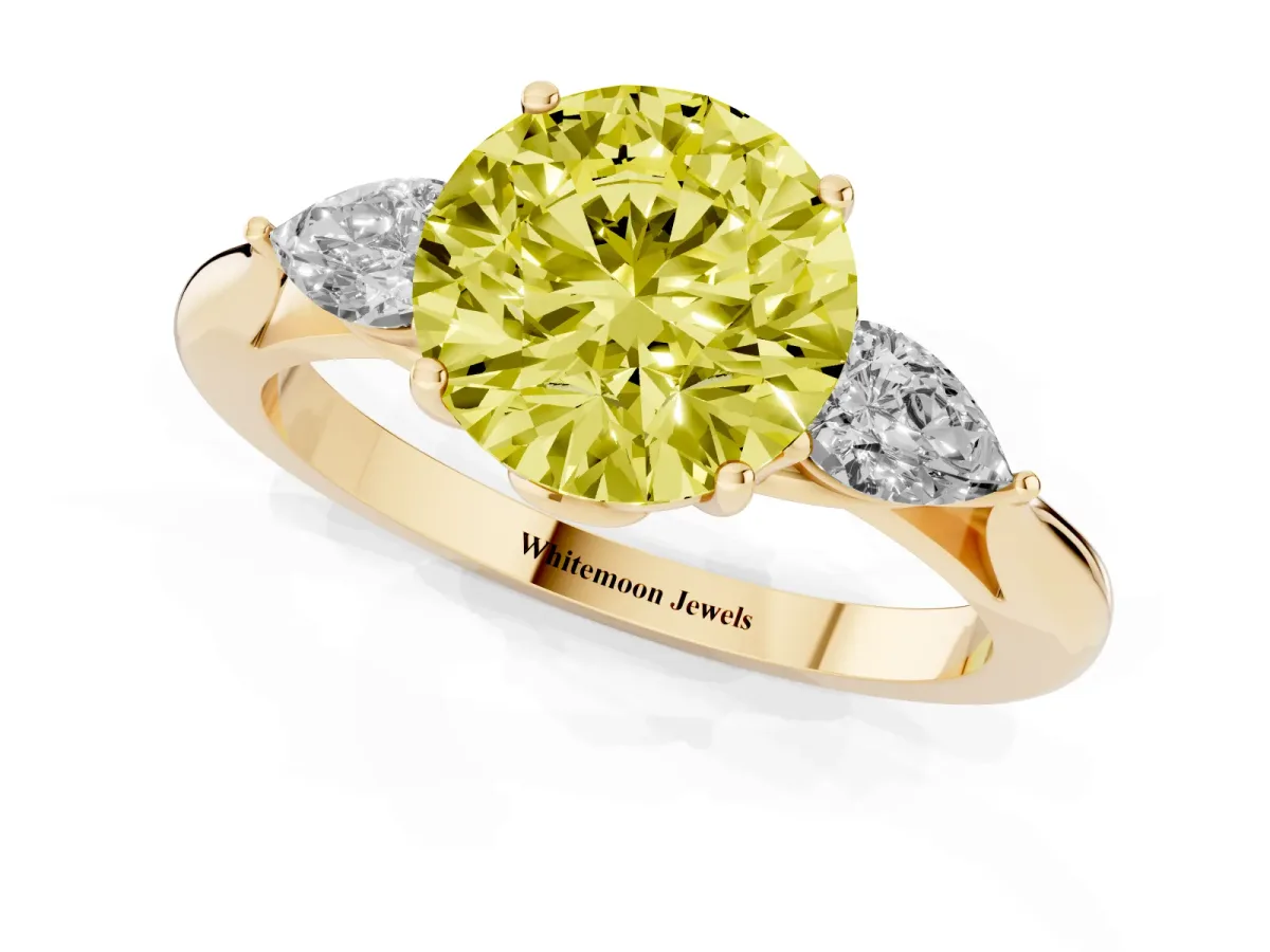 Fancy Yellow Round Cut Diamond Three-Stone Ring with Pear Side Stones and Prong Setting Yellow gold