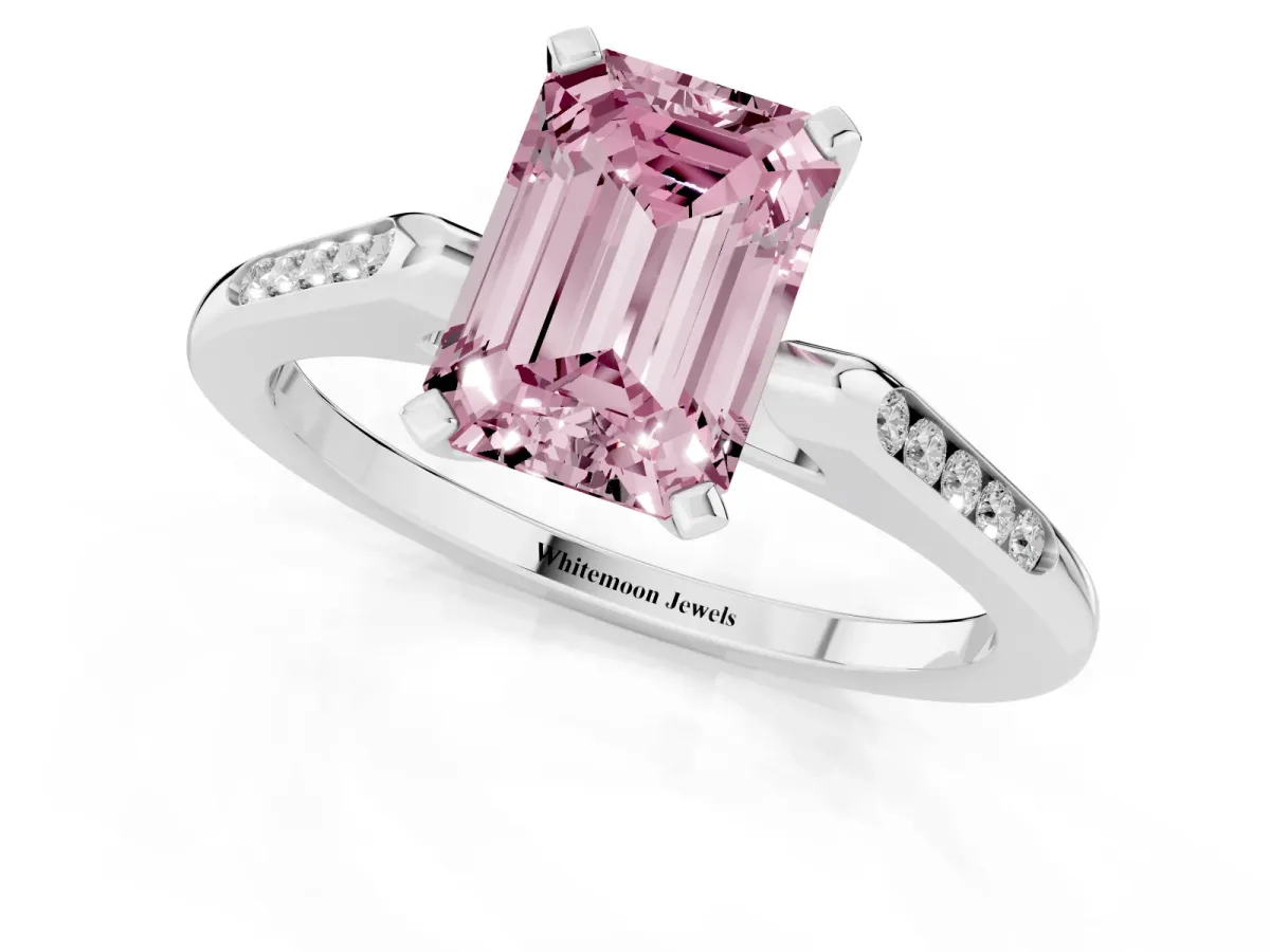 Fancy Pink Emerald Cut Diamond Solitaire Ring with Channel Set Round Band and Prong Setting White gold