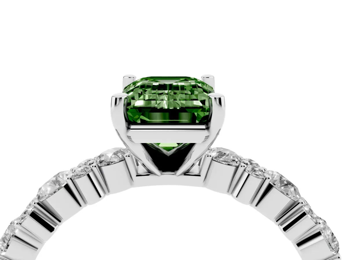 Fancy Green Emerald Cut Diamond Side Stone Solitaire Ring with Round and Four-Prong Setting Silver