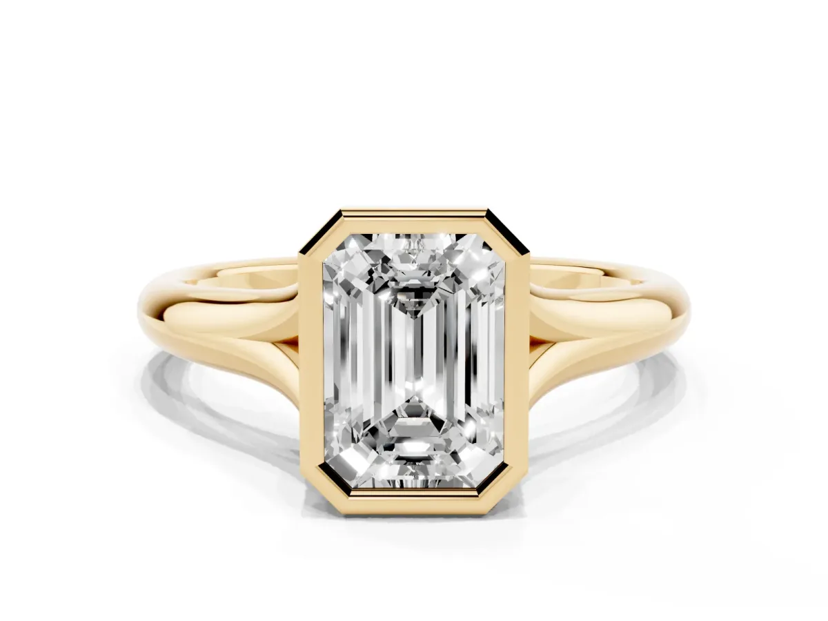 Bezel Set Emerald Cut Solitaire Diamond Ring with Smooth Band Yellow gold