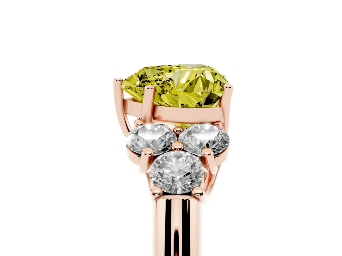 Fancy Yellow Heart Cut Cut Diamond Cluster Ring with Round Accent Stones and Prong Setting on a Classic Band Rose gold