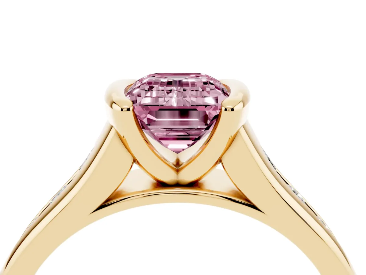 Fancy Pink Emerald Cut Solitaire Bezel-Set Diamond Ring with Channel-Set Band Yellow gold