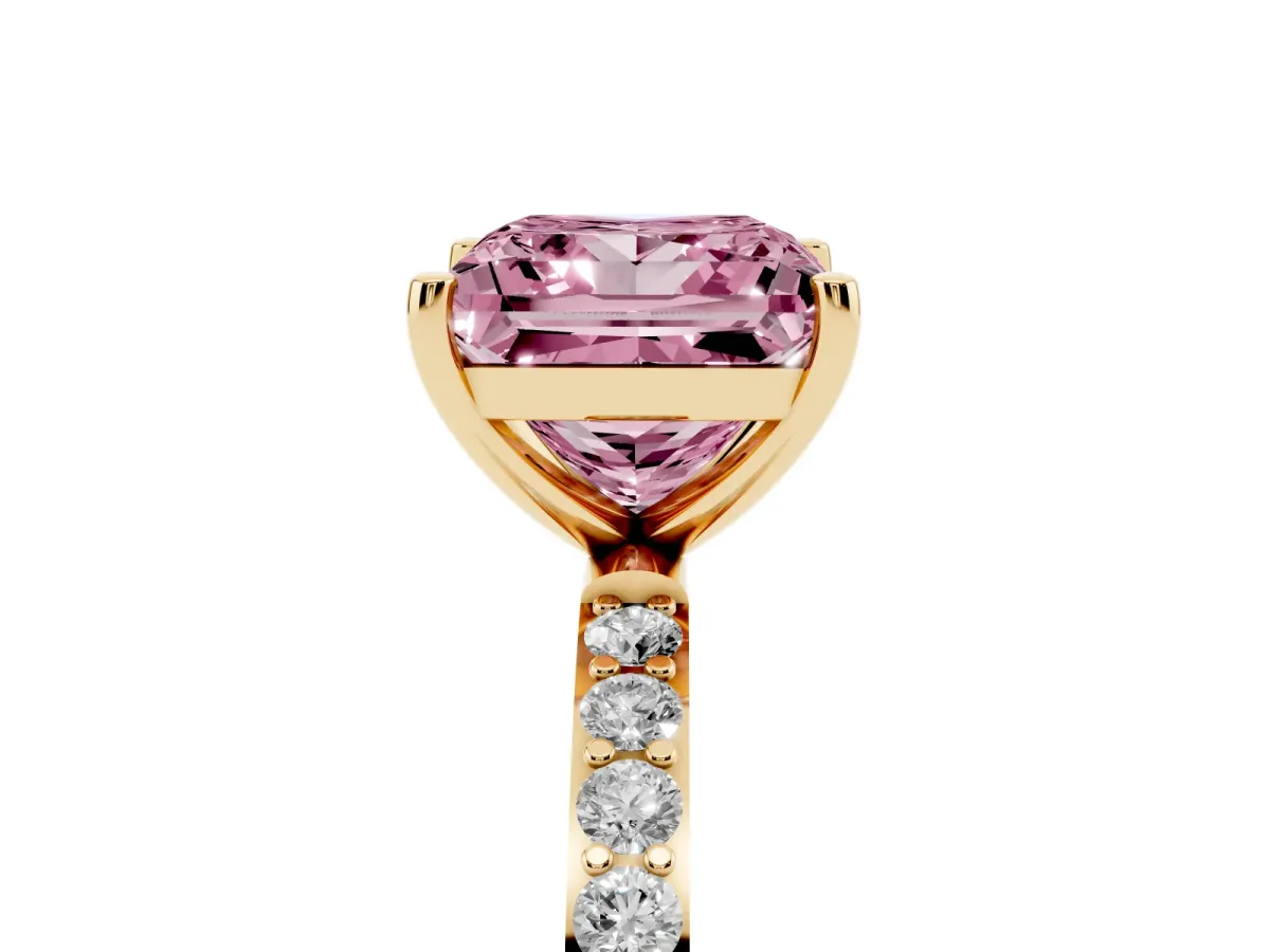 Fancy Pink Princess Cut Diamond Solitaire Ring with Round Pavé Shoulders and Prong Setting Yellow gold