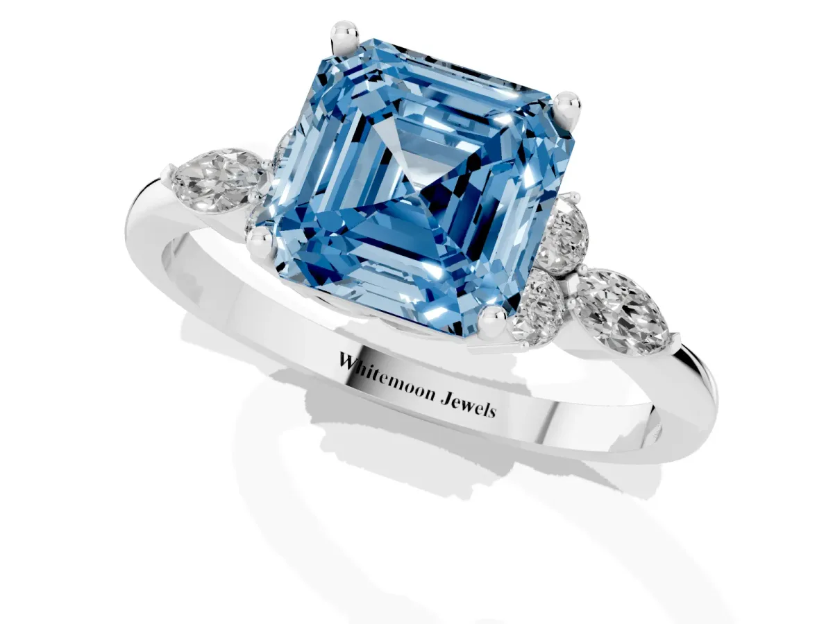 Fancy Blue Asscher Cut Brilliant Diamond Solitaire Ring with Pear Side Stones and Four-Prong Setting Silver