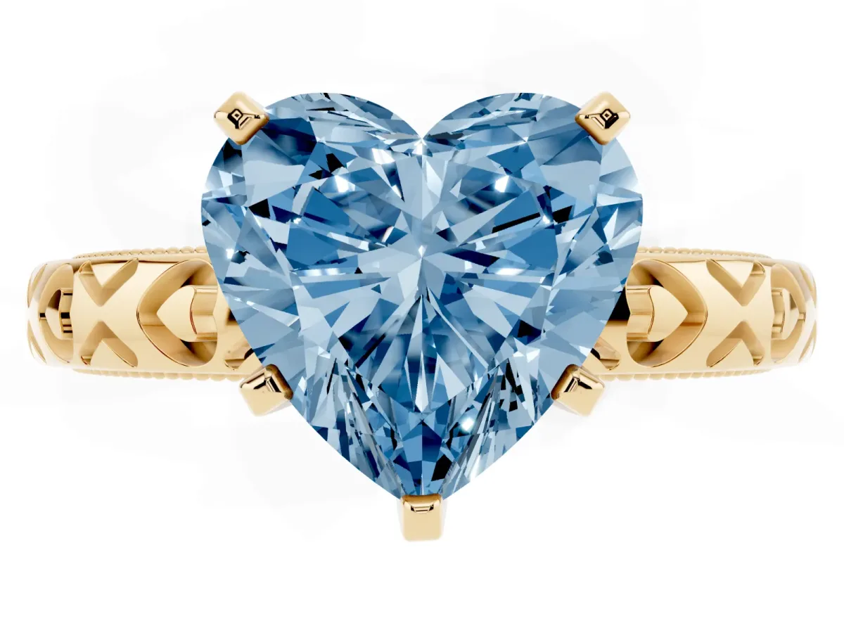 Fancy Blue Heart Cut Solitaire Diamond Engagement Ring with XO Engraved Band and Four-Prong Setting Yellow gold