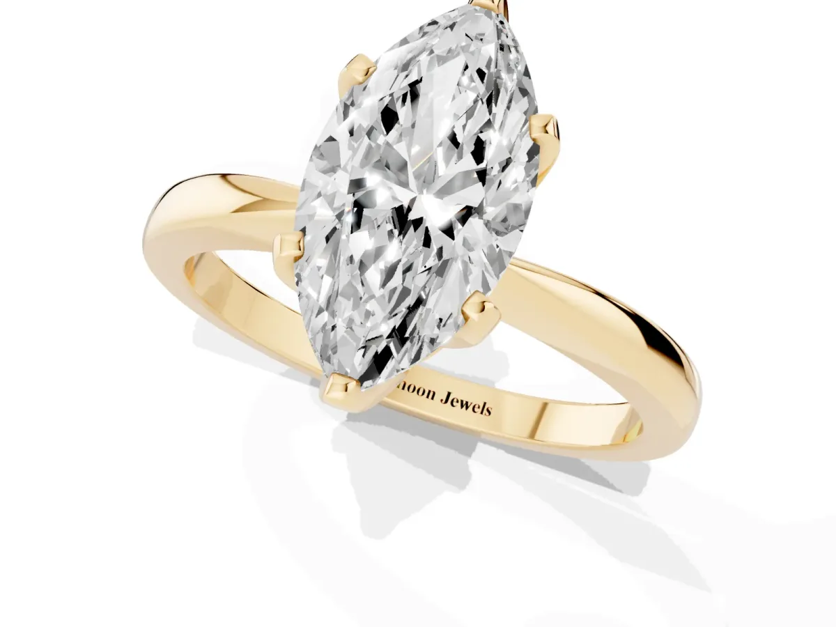 Marquise Cut Solitaire Engagement Ring with Six-Prong Setting and Tapered Band Yellow gold