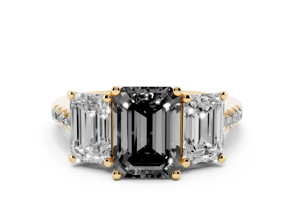 Fancy Black Three-Stone Emerald Cut Diamond Ring with Round Pavé Band and Prong Setting Yellow gold