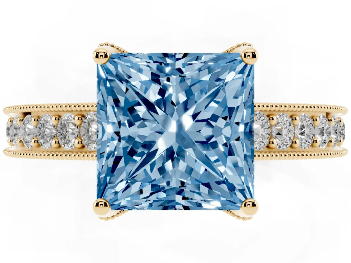 Fancy Blue Princess Cut Cut Diamond Solitaire Ring with Milgrain Pave Band and Four Prong Setting Yellow gold