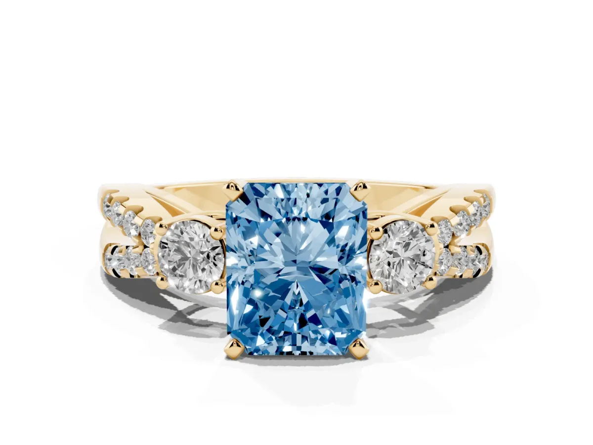 Fancy Blue Radiant Cut Diamond Three-Stone Ring with Pavé Split Shank and Four-Prong Setting Yellow gold