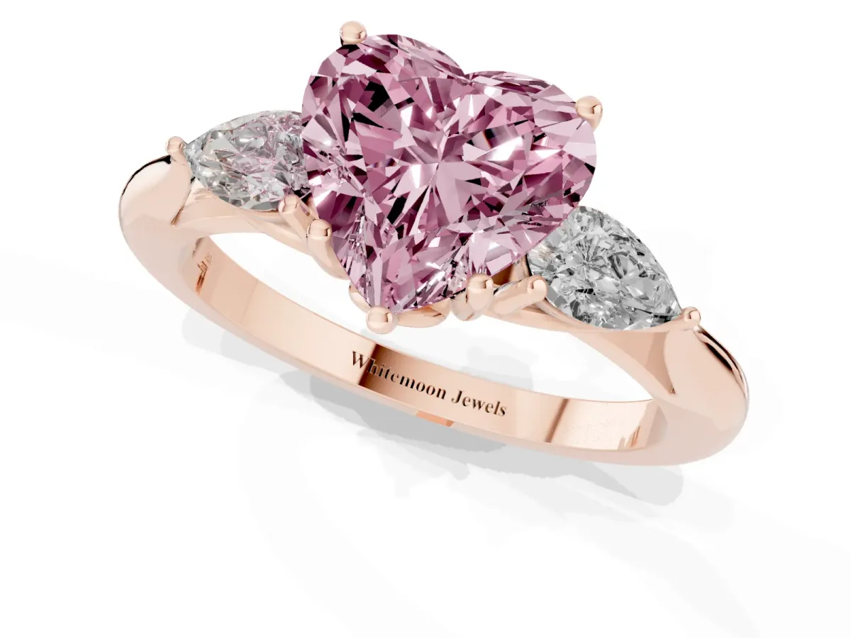Fancy Pink Heart Cut Diamond Three-Stone Ring with Pear Side Stones and Prong Setting Rose gold
