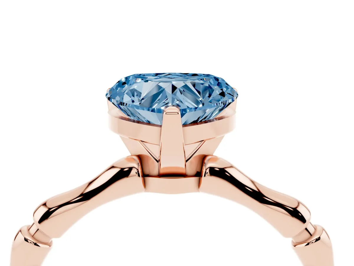 Fancy Blue Heart Cut Solitaire Diamond Ring with Bamboo Band and Four-Prong Setting Rose gold