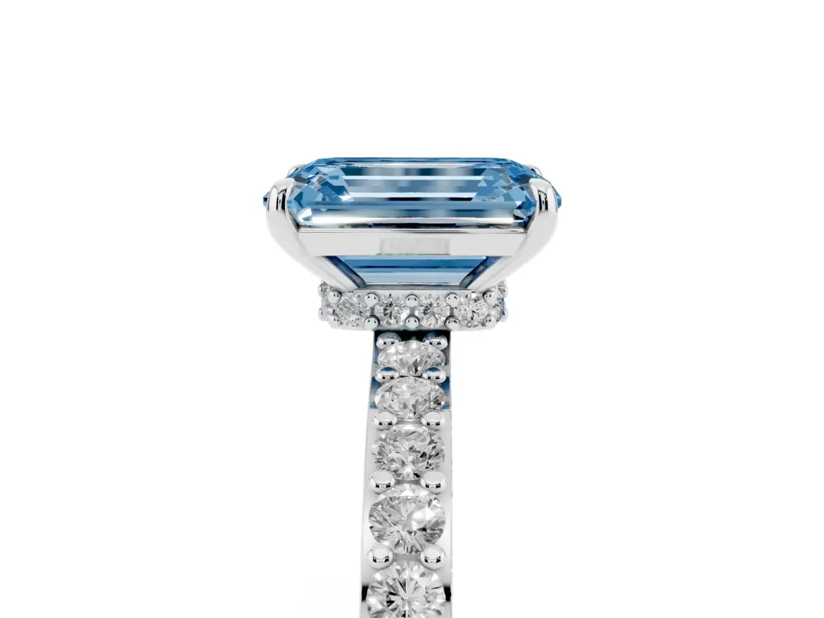 Fancy Blue Emerald Cut Diamond Solitaire Engagement Ring with Pavé Band and Four-Prong Setting Silver