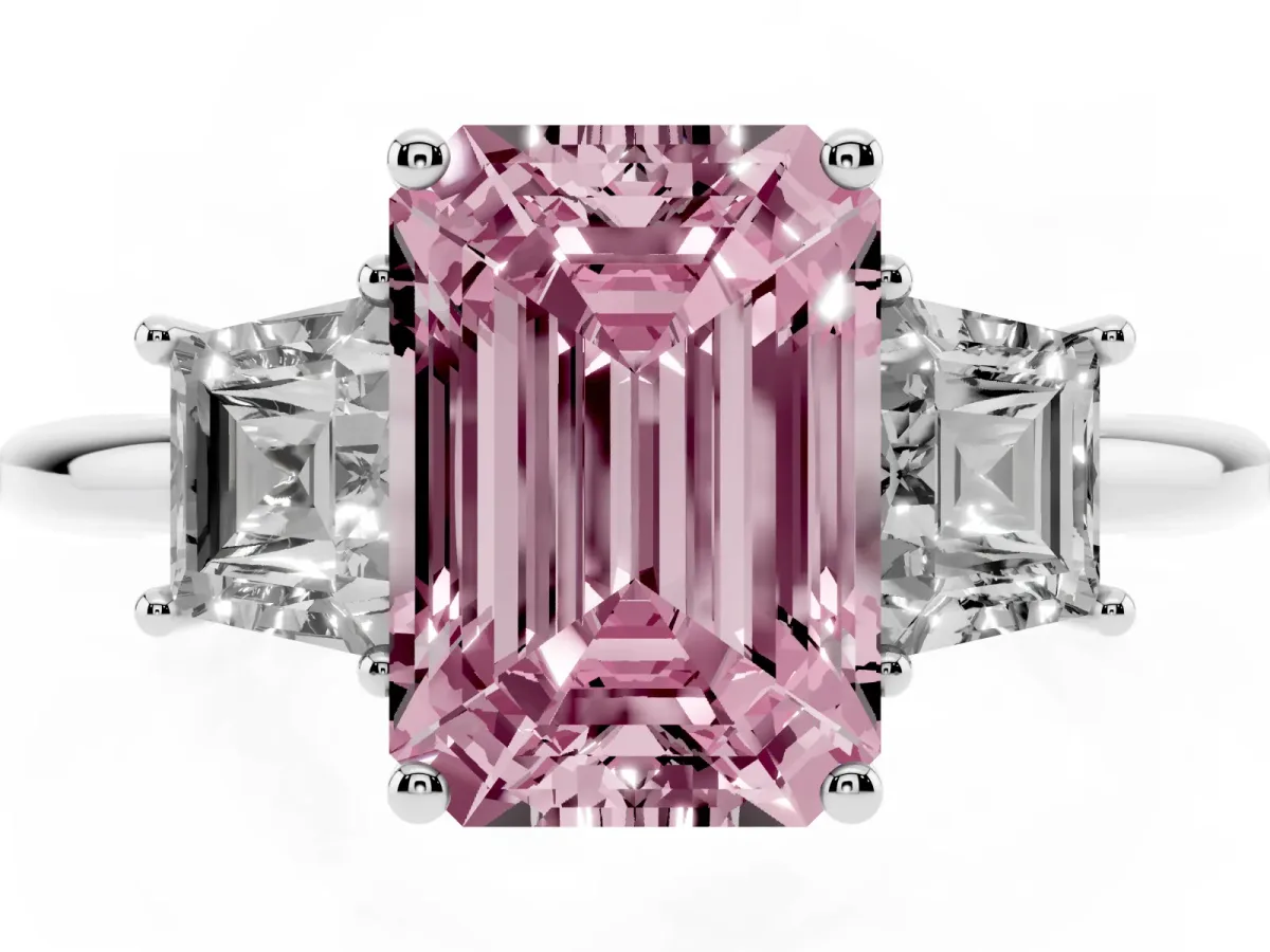 Fancy Pink Emerald Cut Diamond Three-Stone Ring with Trapezoid Side Stones and Prong Setting Platinum