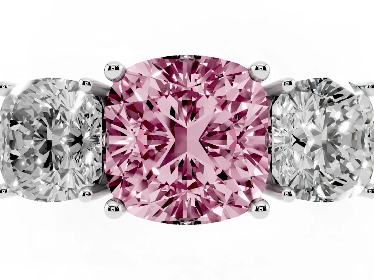 Fancy Pink Three-Stone Cushion Cut Cut Diamond Engagement Ring with Prong Setting on a White Gold Band Platinum