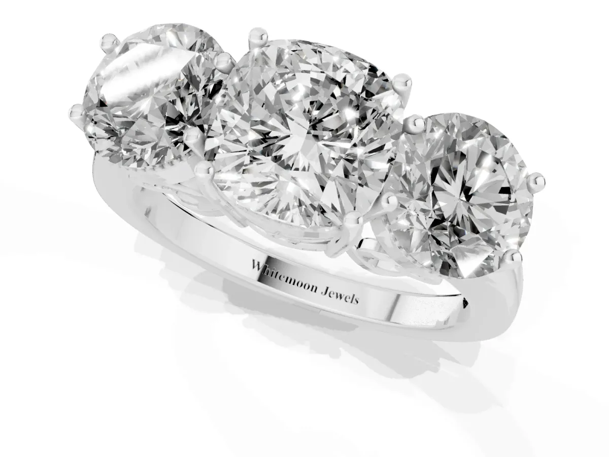 Three-Stone Cushion Cut Diamond Engagement Ring with Prong Setting on a Classic Band Silver