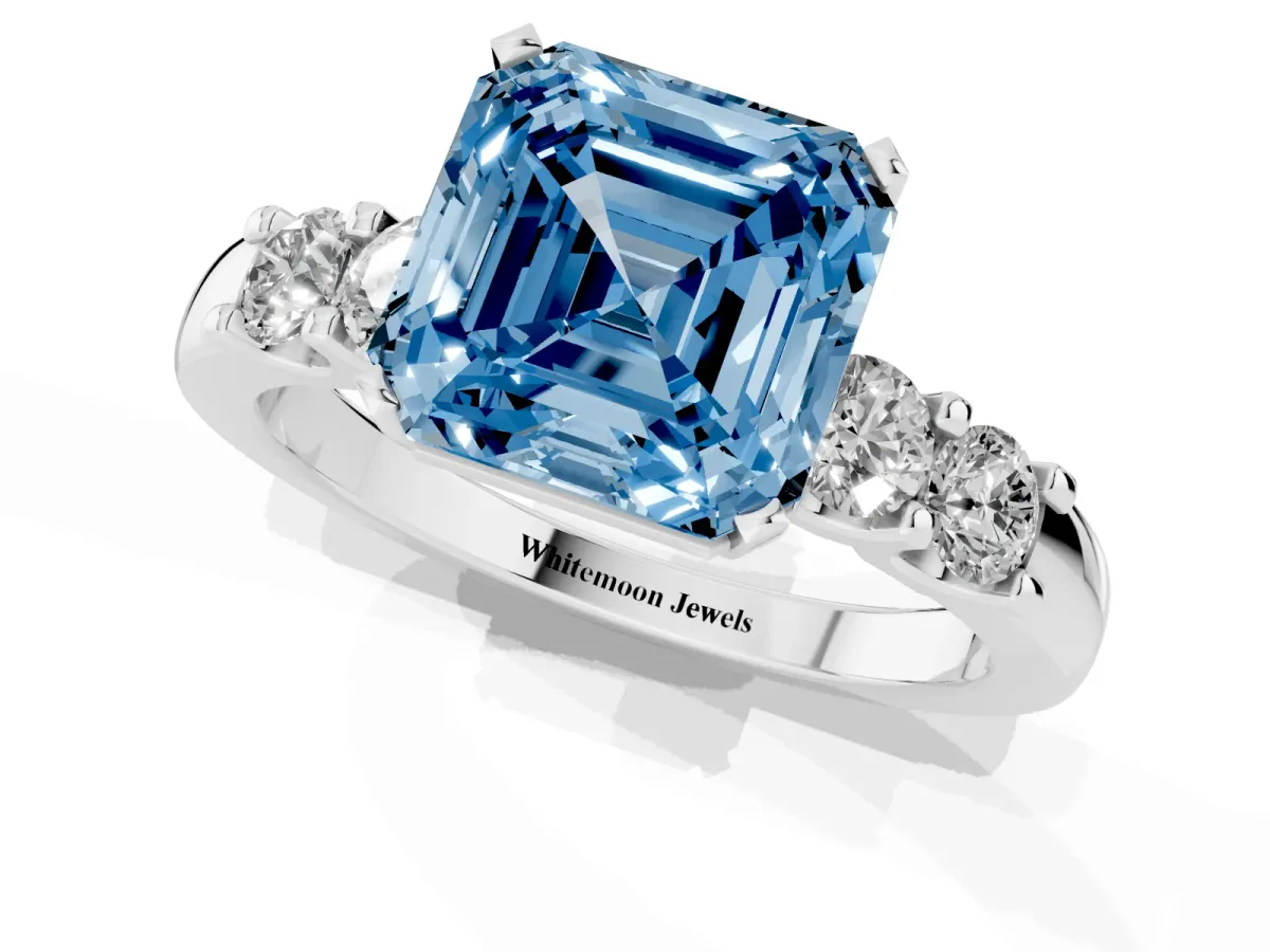 Fancy Blue Asscher Cut Brilliant Cut Diamond Five-Stone Prong Set Engagement Ring with Channel Band Platinum