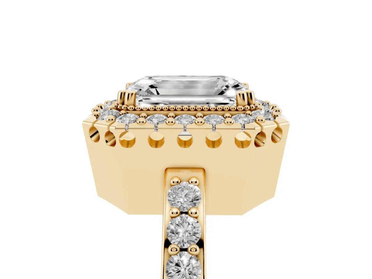 Emerald Cut Diamond Halo Ring with Pavé Band and Prong Setting Yellow gold