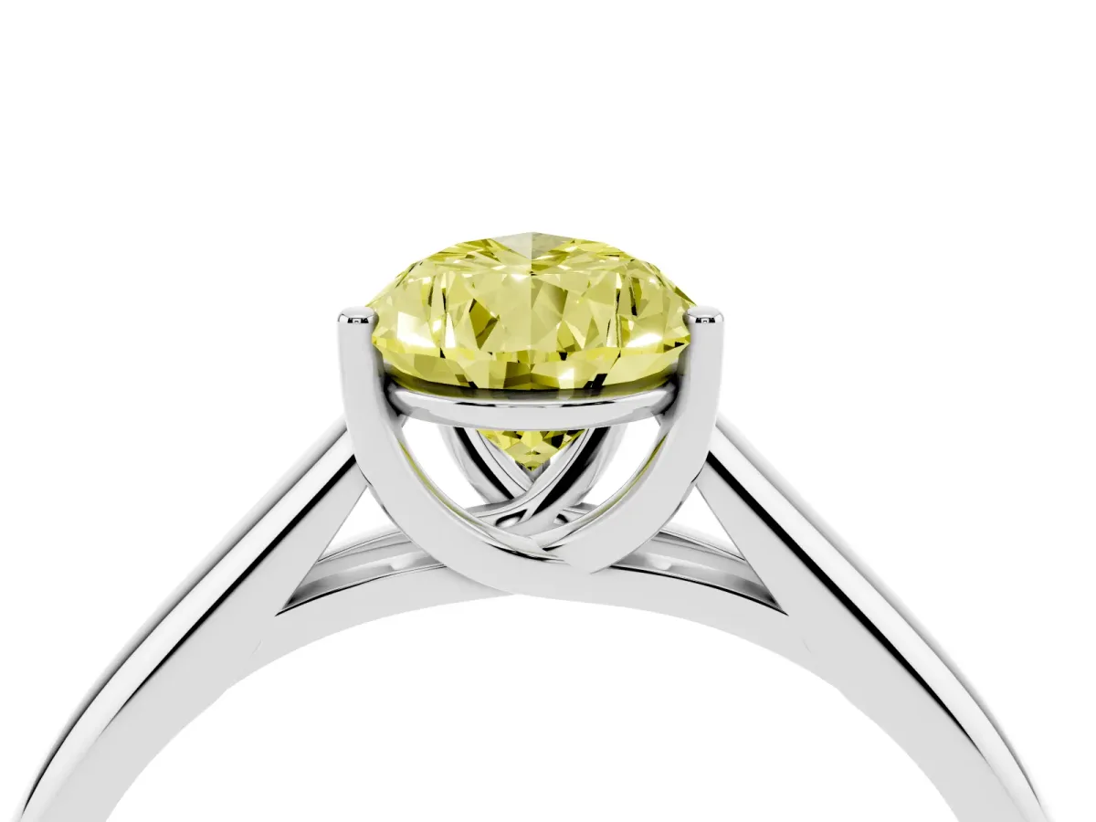Fancy Yellow Pear Cut Solitaire Engagement Ring with Tapered Band and Four-Prong Setting Silver