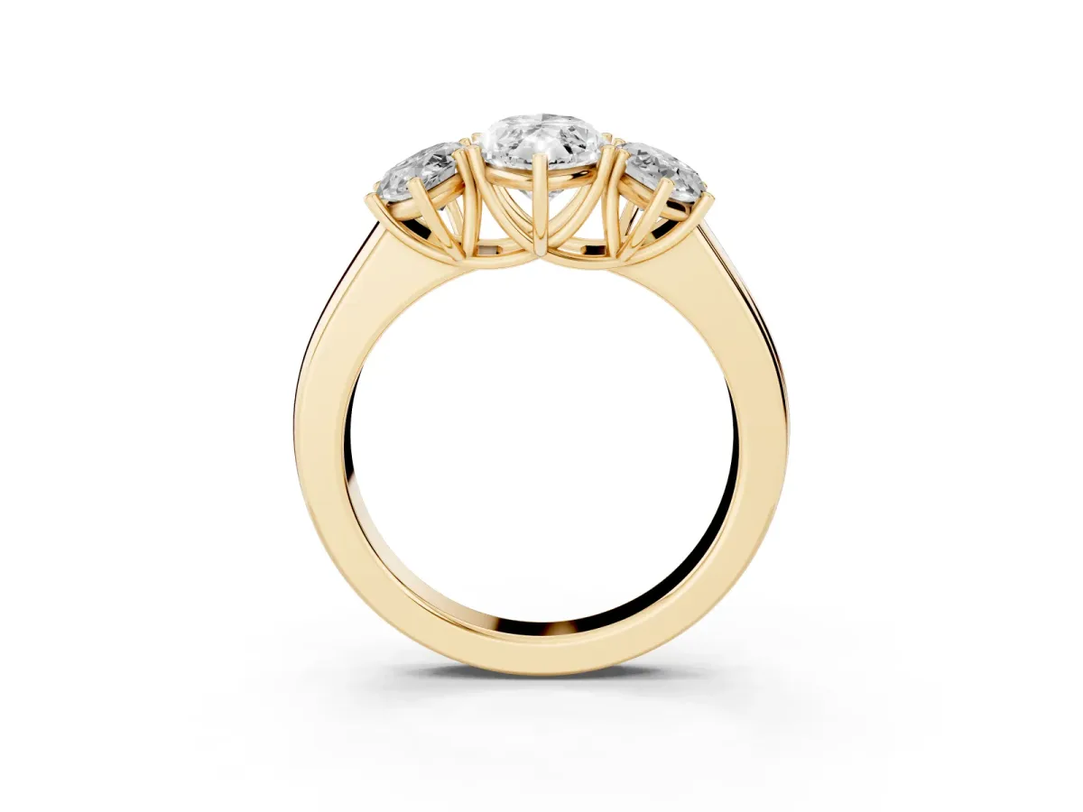Three-Stone Marquise Cut Cut Diamond Ring with Prong Setting and Classic Band Yellow gold