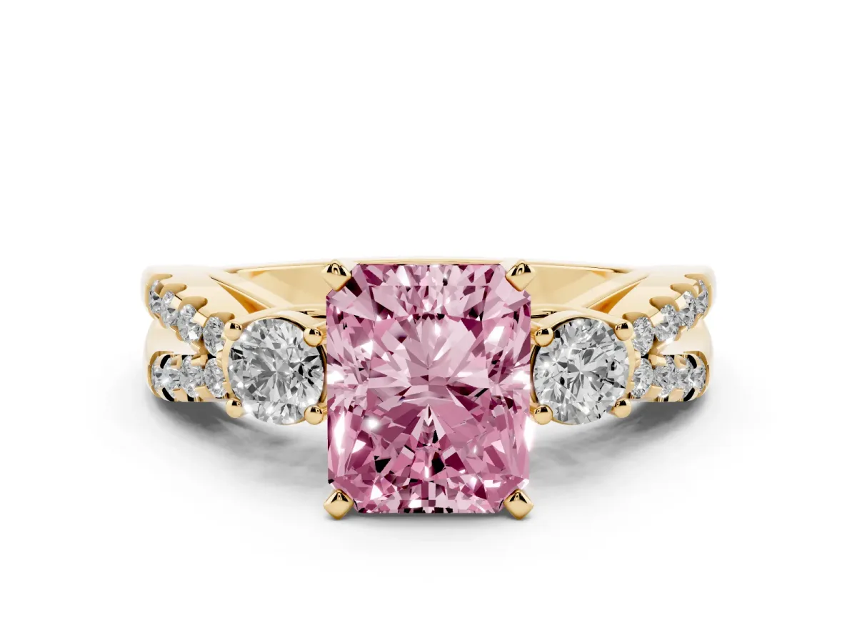 Fancy Pink Radiant Cut Diamond Three-Stone Ring with Pavé Split Shank and Four-Prong Setting Yellow gold