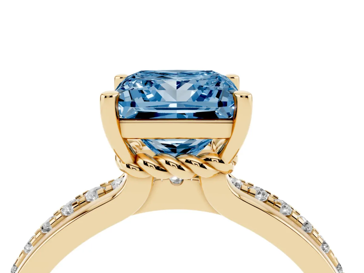 Fancy Blue Princess Cut Solitaire Diamond Ring with Channel Set Band and Six-Prong Setting Yellow gold