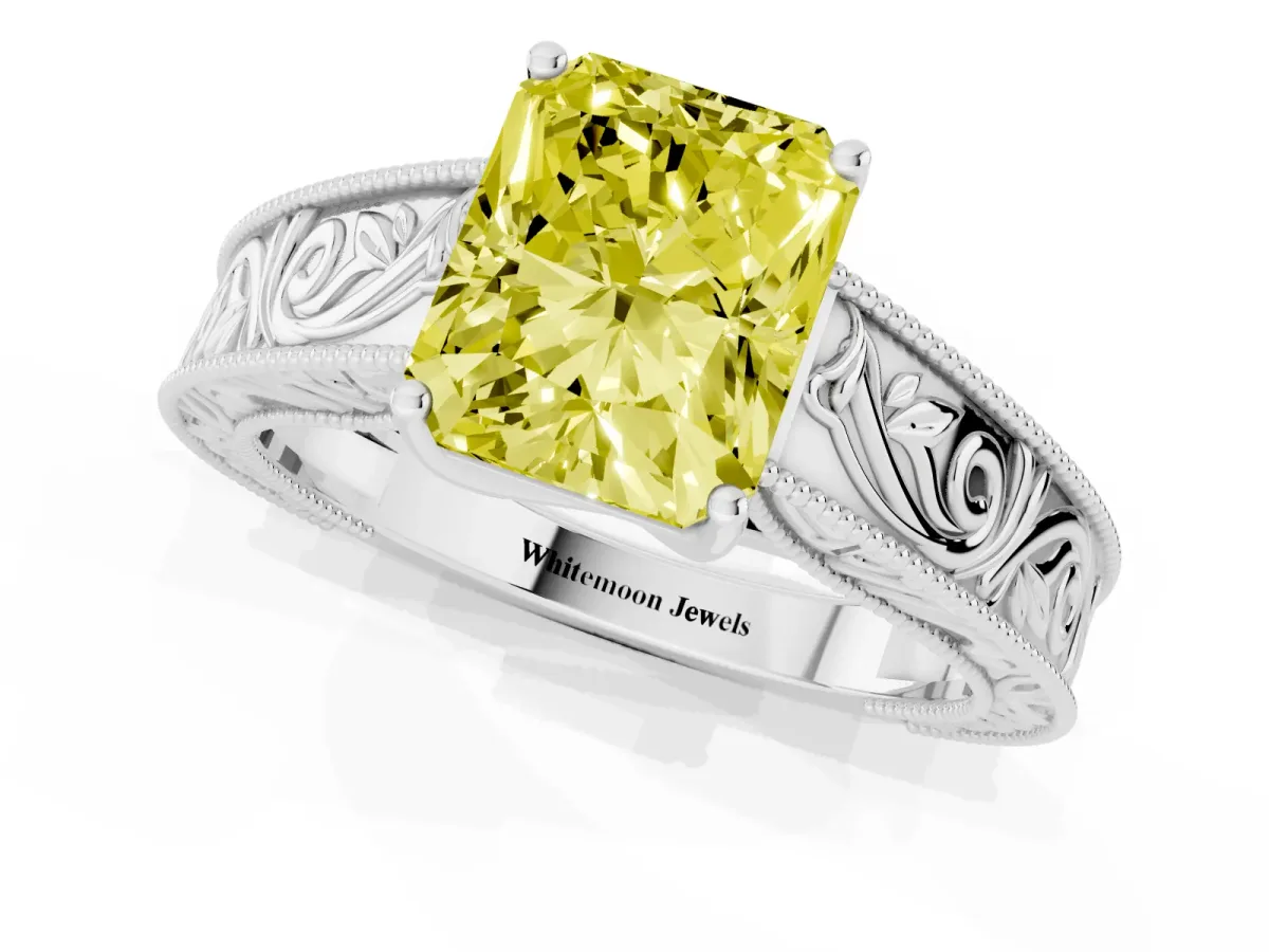 Fancy Yellow Radiant Cut Diamond Solitaire Ring with Engraved Band and Four-Prong Setting White gold