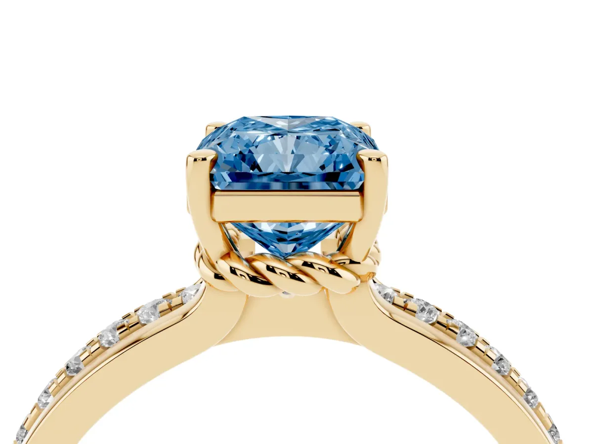 Fancy Blue Radiant Cut Solitaire Diamond Ring with Channel Set Band and Six-Prong Setting Yellow gold