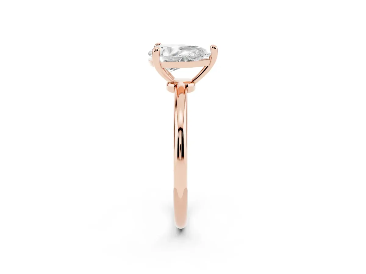 Pear Cut Solitaire Diamond Ring with 4-Prong Setting on a Classic Band Rose gold