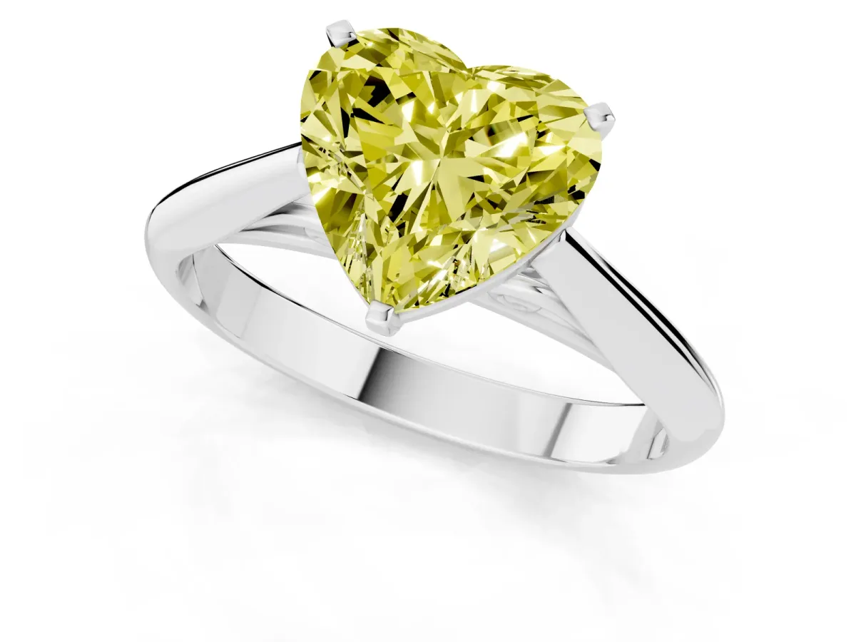 Fancy Yellow Heart Cut Diamond Solitaire Engagement Ring with Cathedral Setting and Four-Prong Mount Silver