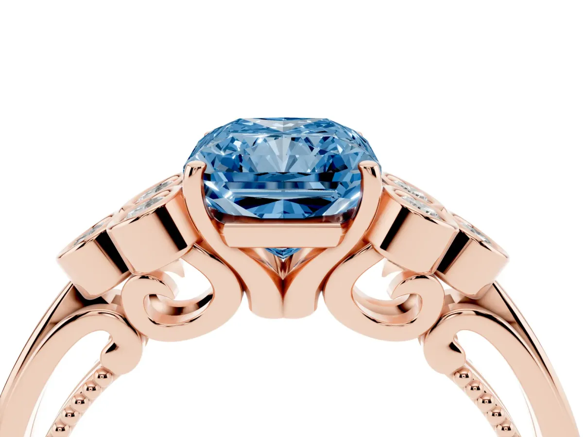 Fancy Blue Radiant Cut Cut Diamond Engagement Ring with Bezel Set Round Side Stones and Prong Setting Rose gold