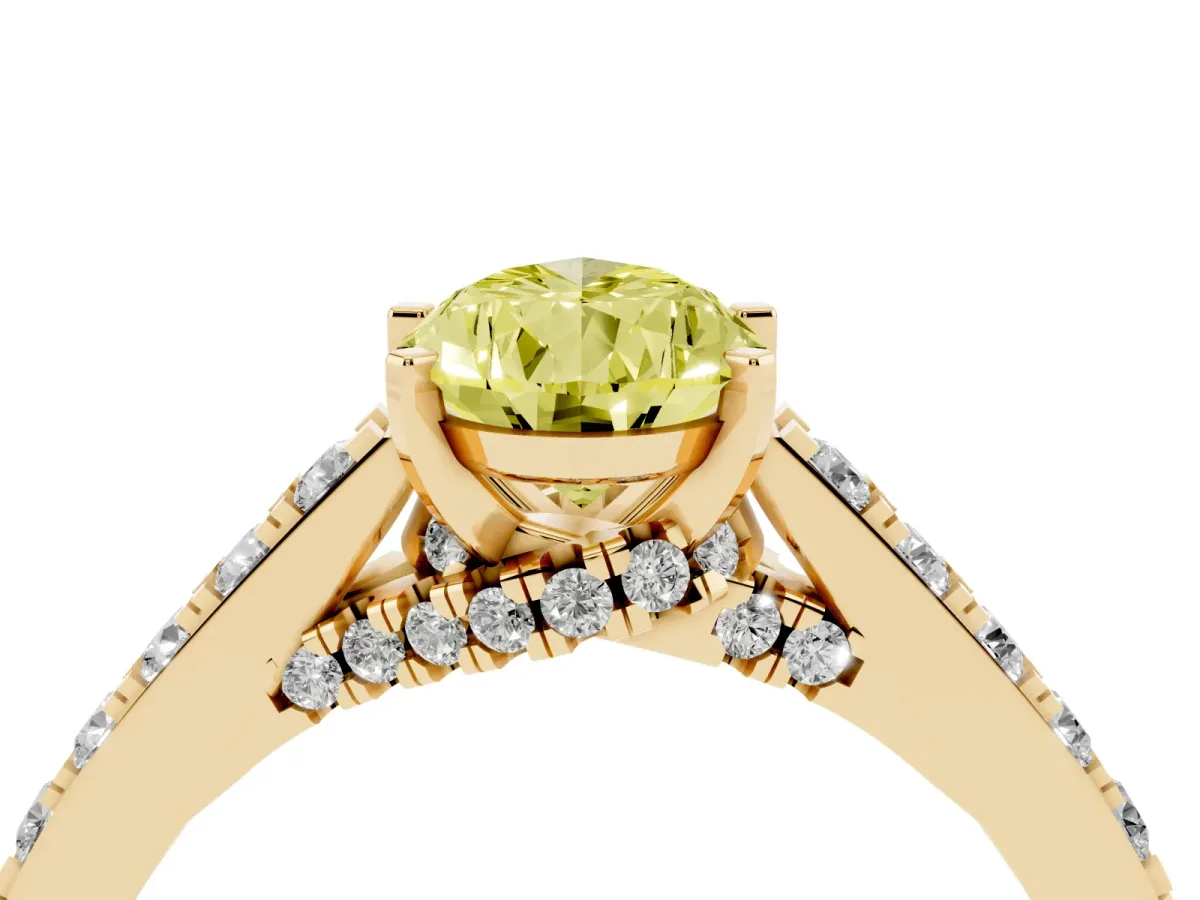 Fancy Yellow Pear Cut Diamond Solitaire Ring with Crossover Gallery and Round Pavé Band Yellow gold