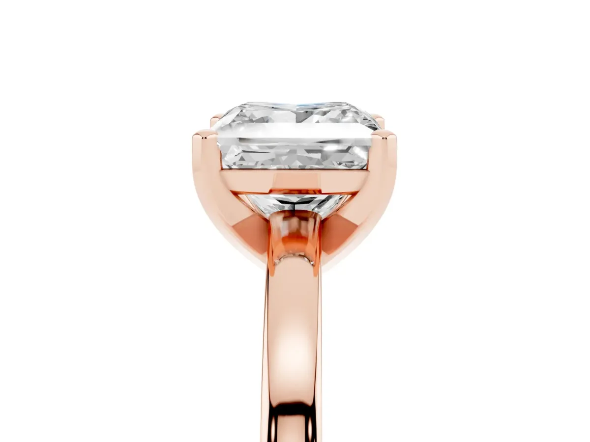 Princess Cut Solitaire Diamond Engagement Ring with Four-Prong Setting on a Classic Band Rose gold