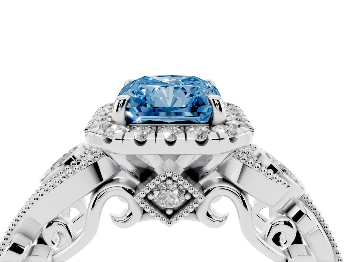 Fancy Blue Radiant Cut Diamond Halo Ring with Milgrain Pavé Band and Four-Prong Setting Silver