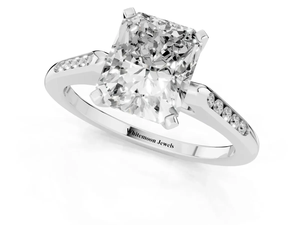 Radiant Cut Diamond Solitaire Ring with Channel Set Round Band and Prong Setting Silver