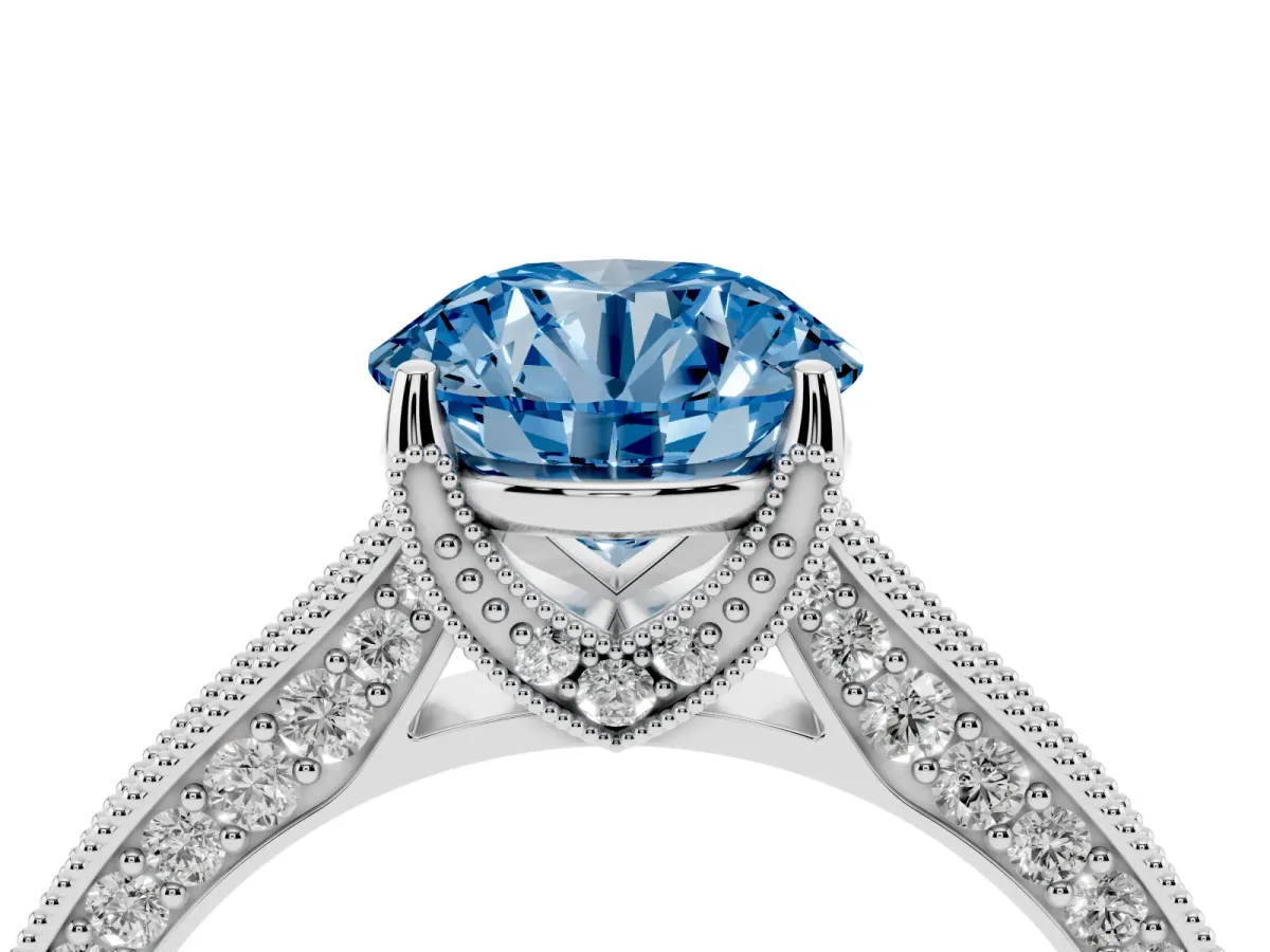 Fancy Blue Round Cut Cut Diamond Solitaire Ring with Milgrain Pave Band and Four Prong Setting Silver