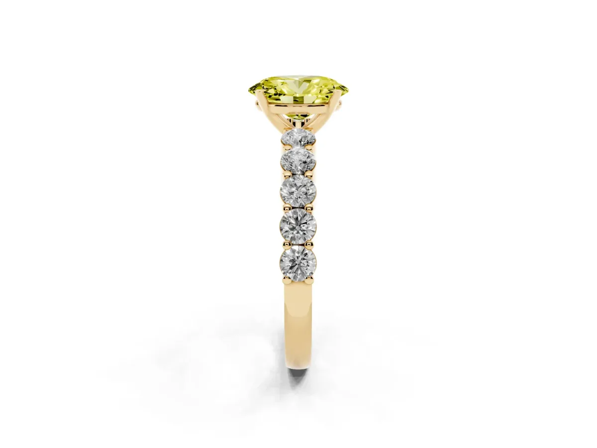 Fancy Yellow Oval Cut Diamond Solitaire Ring with Shared Prong Round Side Stones Yellow gold
